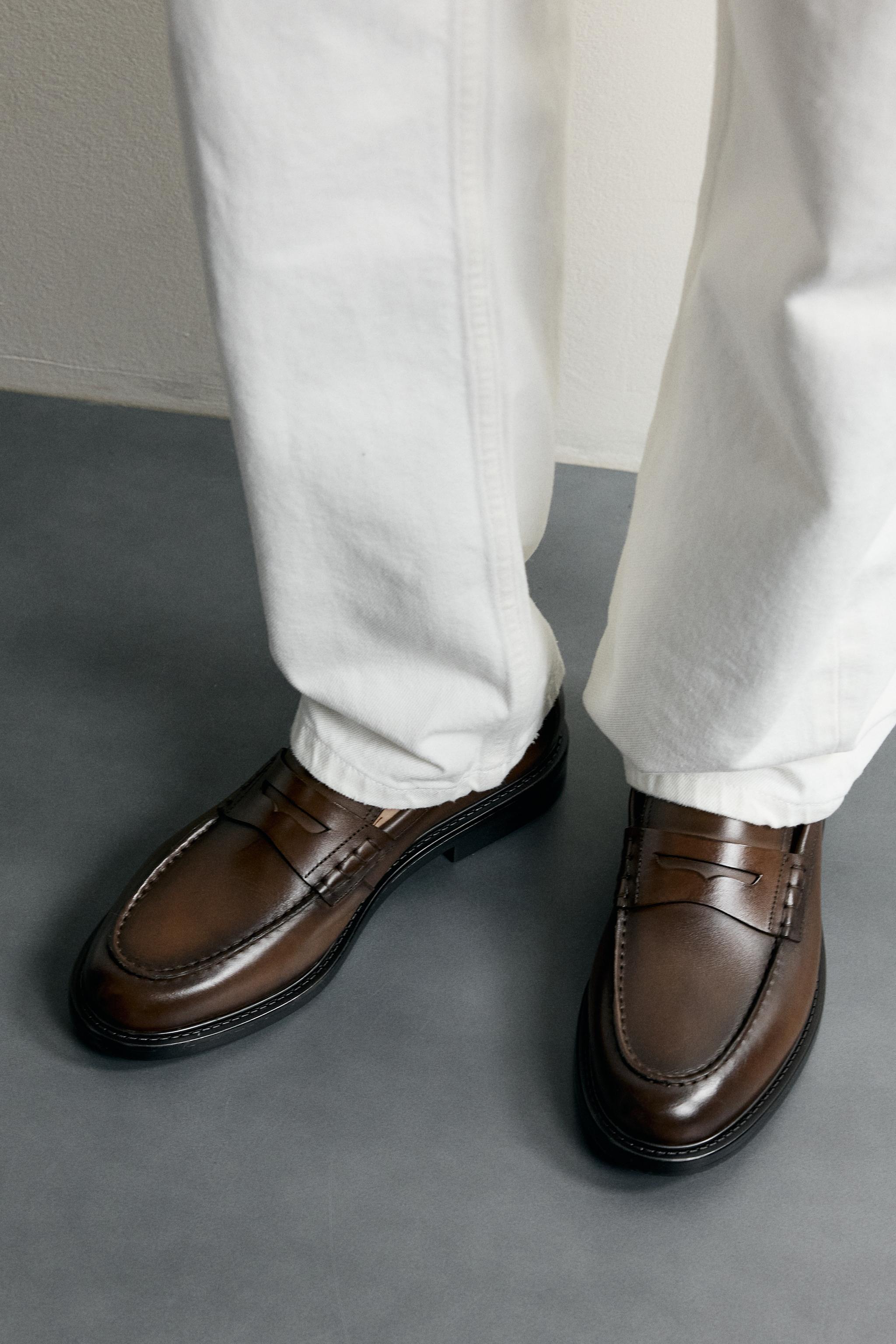 MOCASSINS EN CUIR AVEC MASQUE
